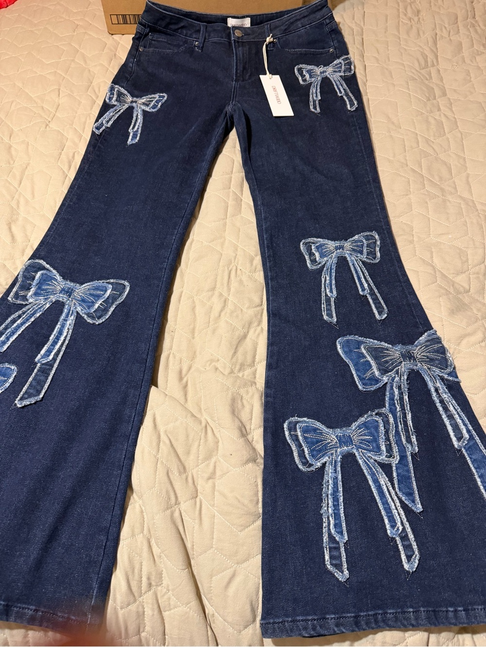 Driftwood bow jeans, size 29 NWT